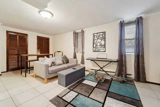 a living room with furniture and a table