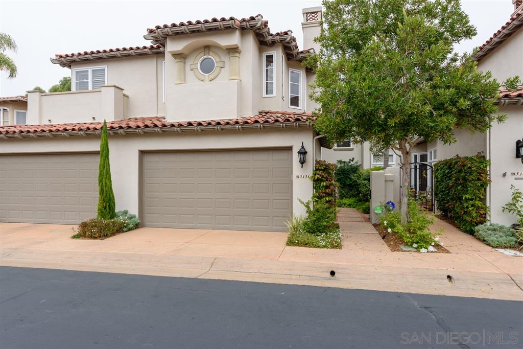 front view of a house with a garage