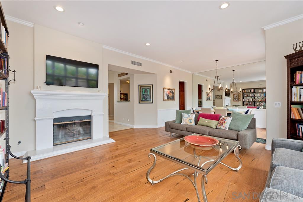 3138 Hamburg Square La Jolla, CA 92037 - Photo 2 of 25 a living room with furniture and a fireplace