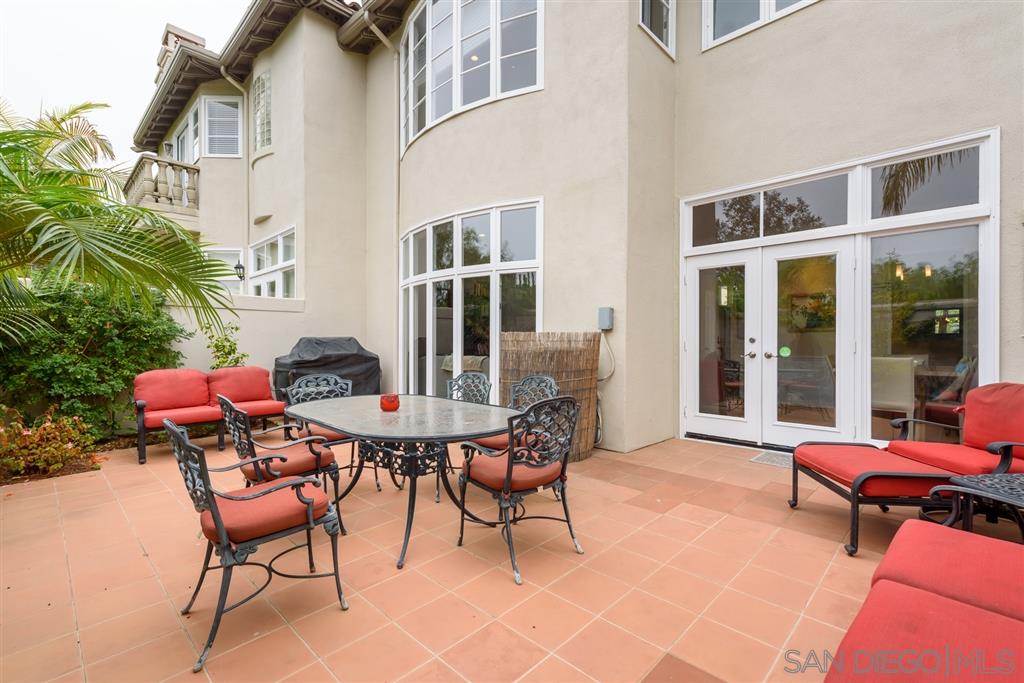 3138 Hamburg Square La Jolla, CA 92037 - Photo 22 of 25 a backyard of a house with table and chairs