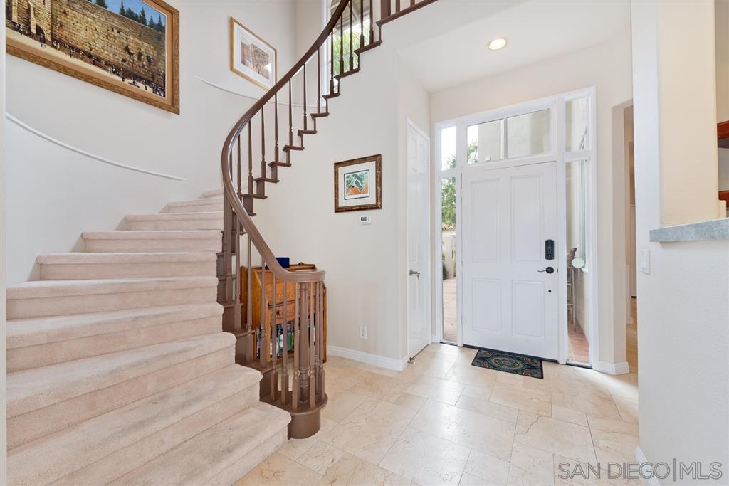 3138 Hamburg Square La Jolla, CA 92037 - Photo 6 of 25 a view of entryway and hall with wooden floor