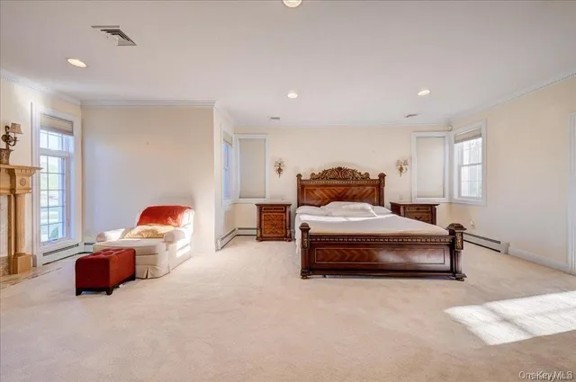 a bedroom with bed and window