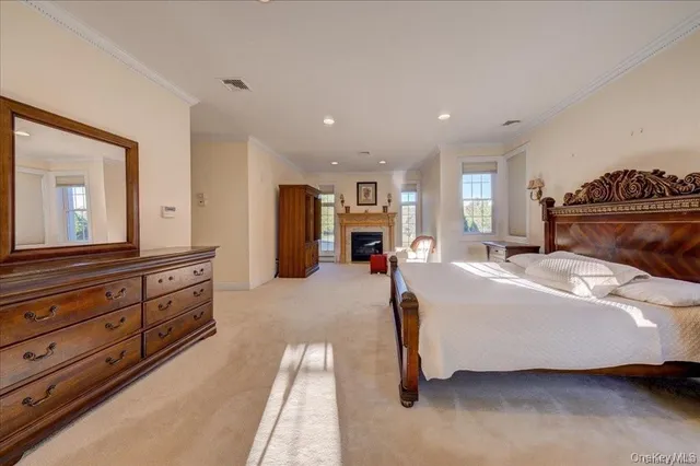 a bed room with a bed and a dresser