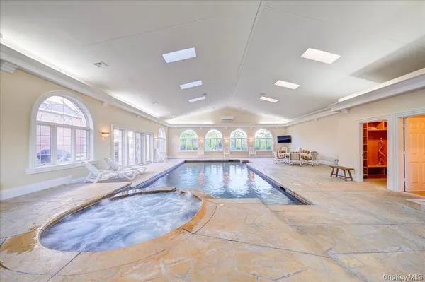 a view of a room with lots of gym equipment