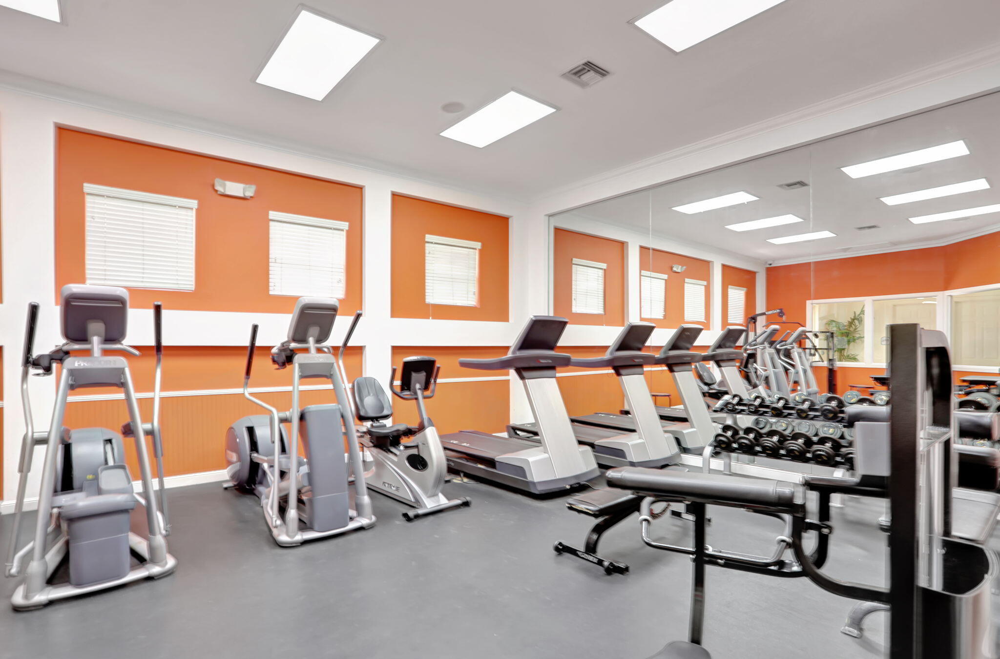 5880 West Sample Road, Unit 206 Coral Springs, FL 33067 - Photo 34 of 37 a view of a room with gym equipment