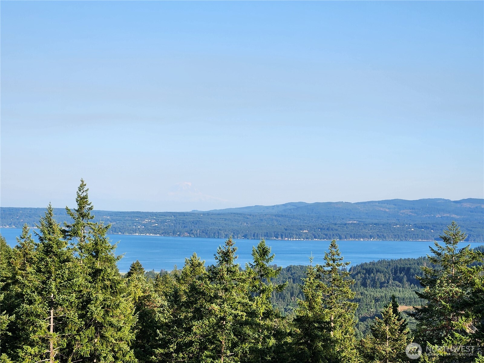 0 Rocky Brook Road, Unit LOT J Brinnon, WA 98320 - Photo 2 of 9 an aerial view of a house with mountain view