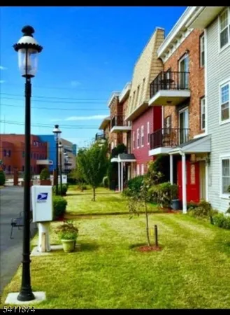 a view of a building with a swimming pool