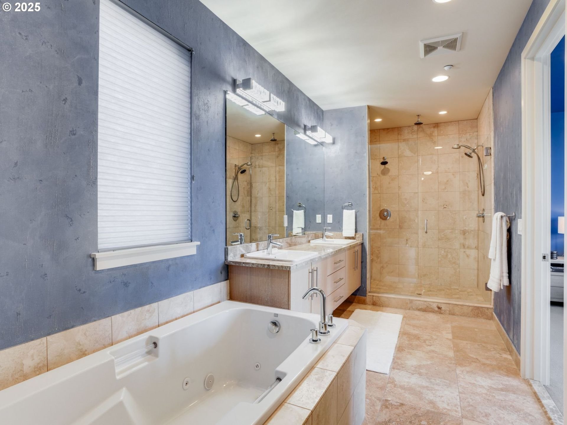 1714 Northwest Riverscape Street Portland, OR 97209 - Photo 13 of 19 a bathroom with a tub sink shower and mirror