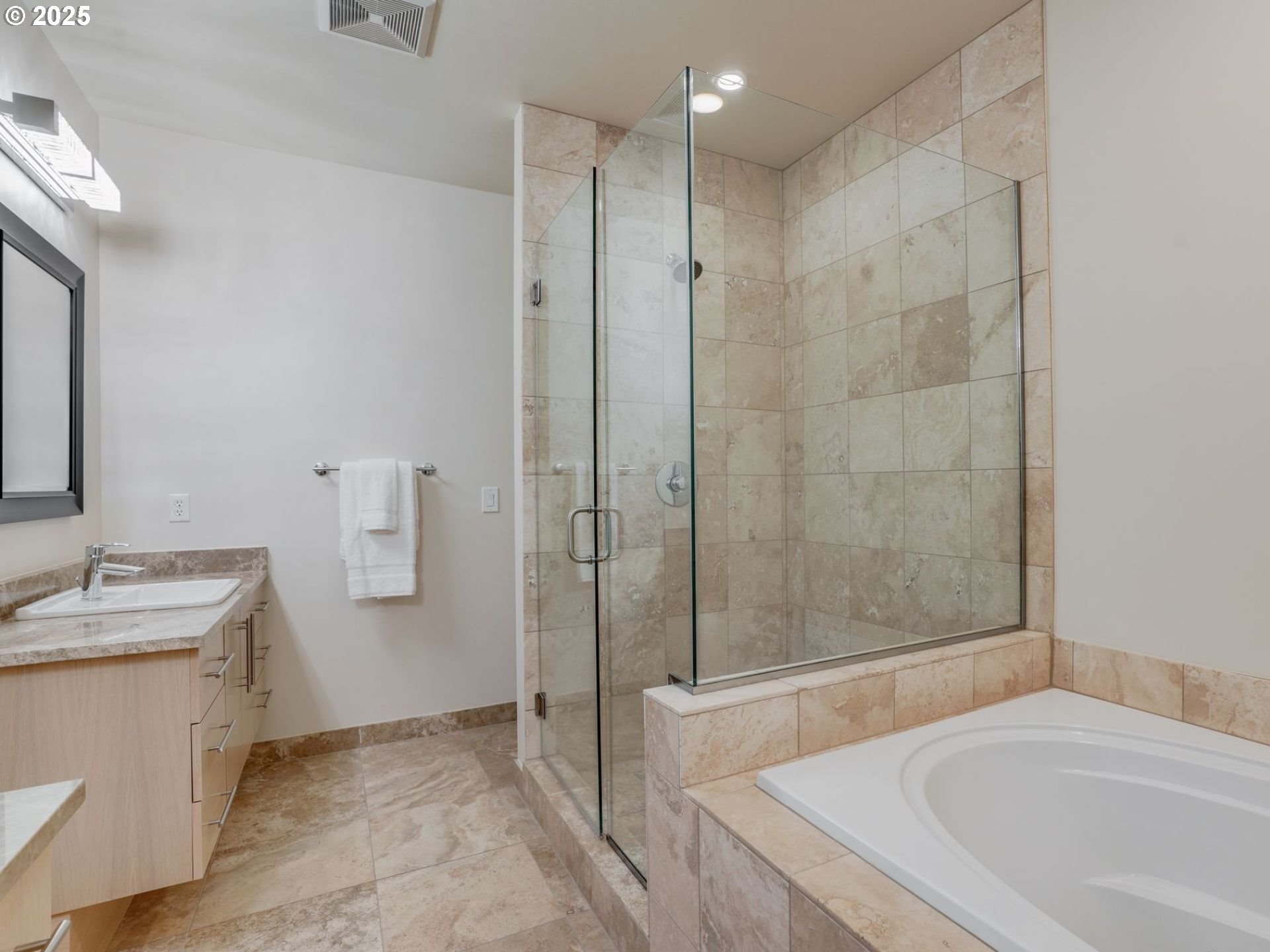 1714 Northwest Riverscape Street Portland, OR 97209 - Photo 16 of 19 a bathroom with a granite countertop sink a toilet and shower