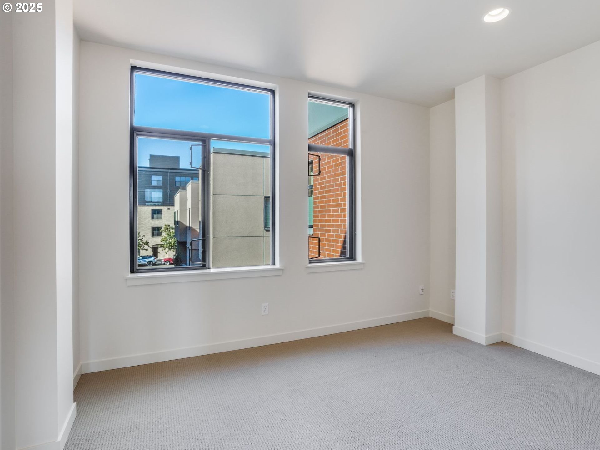 1714 Northwest Riverscape Street Portland, OR 97209 - Photo 17 of 19 an empty room with windows