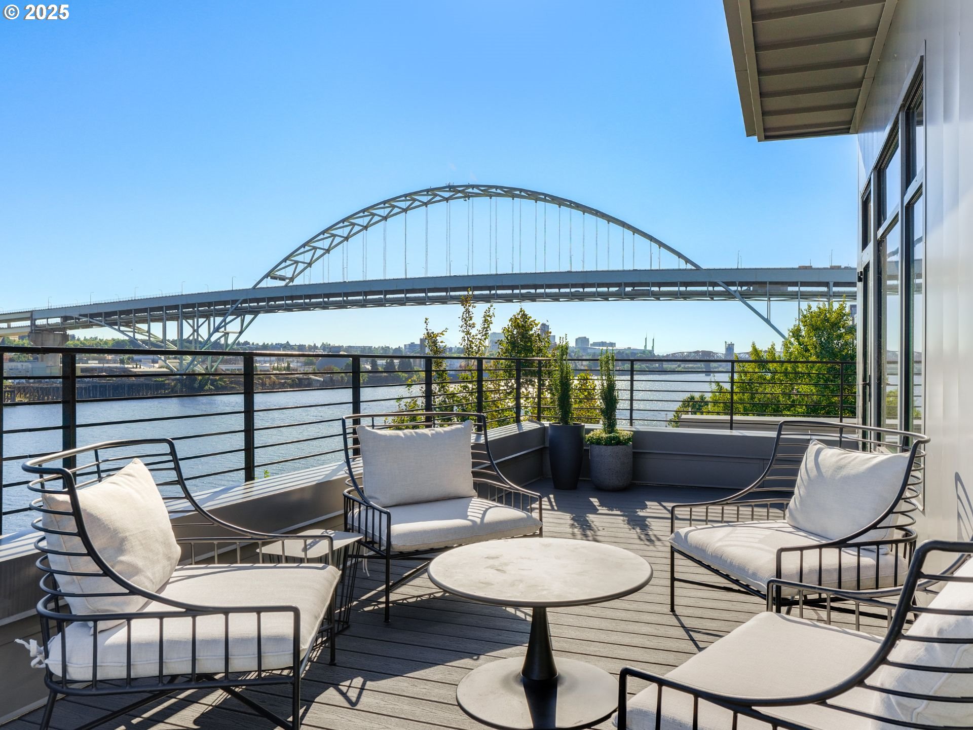 1714 Northwest Riverscape Street Portland, OR 97209 - Photo 19 of 19 a balcony with table and chairs