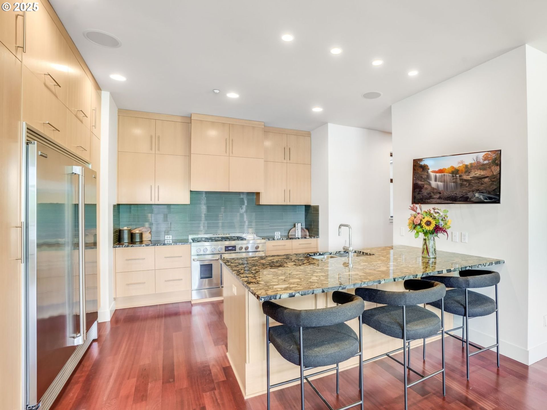 1714 Northwest Riverscape Street Portland, OR 97209 - Photo 6 of 19 a kitchen with a table and chairs in it