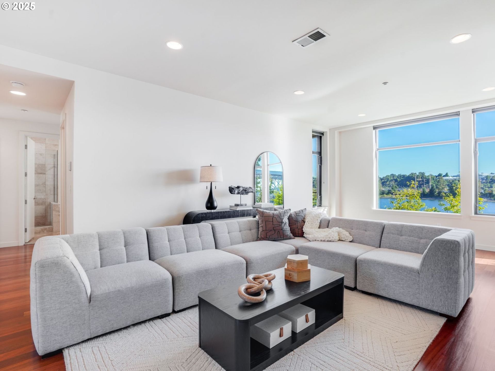 1714 Northwest Riverscape Street Portland, OR 97209 - Photo 9 of 19 a living room with furniture and a large window