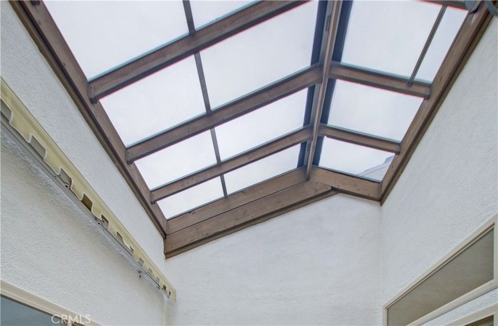 8855 Sutter Circle, Unit 515B Huntington Beach, CA 92646 - Photo 23 of 61 Enclosed Atrium with glass top that opens.