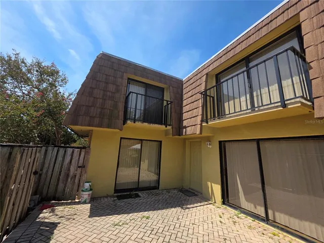 a view of a house with a balcony