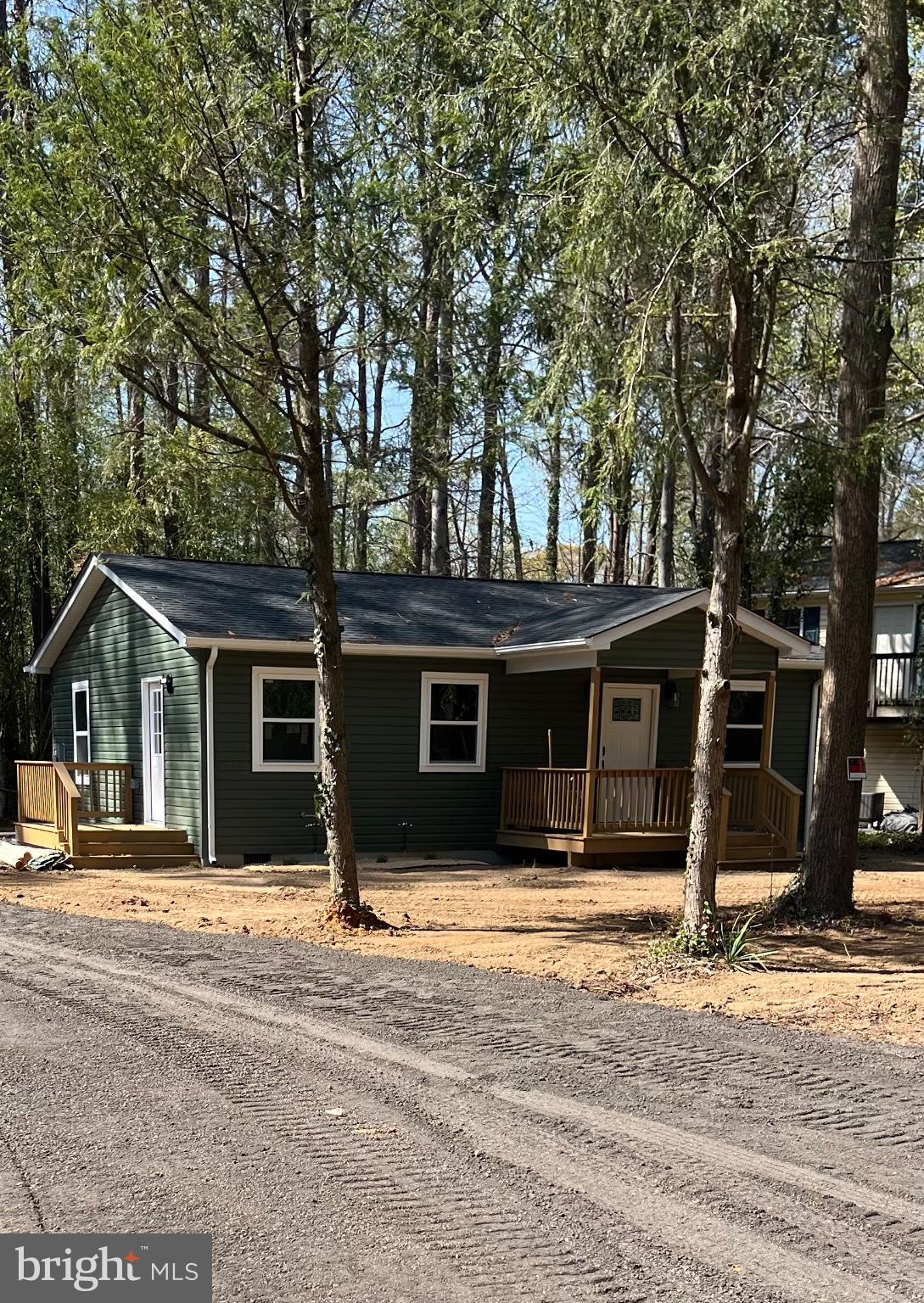 a house with trees in the background