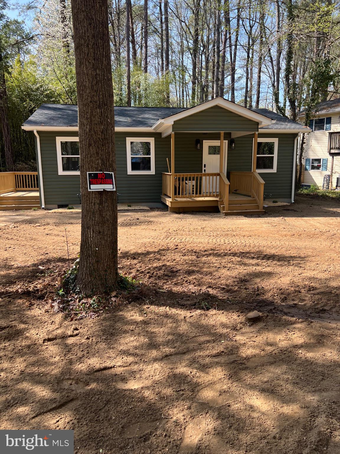 11551 Hoofbeat Trail Lusby, MD 20657 - Photo 2 of 10 a front view of a house with garden