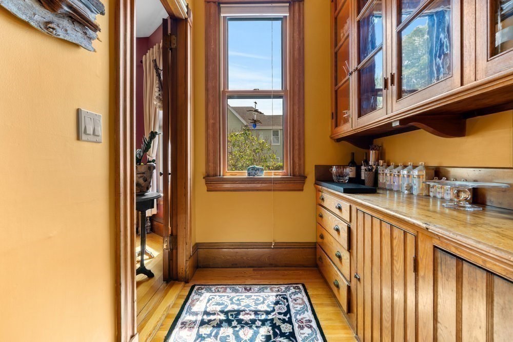 191 Cottage Park Road Winthrop, MA 02152 - Photo 12 of 41 a kitchen with stainless steel appliances granite countertop a refrigerator and a sink