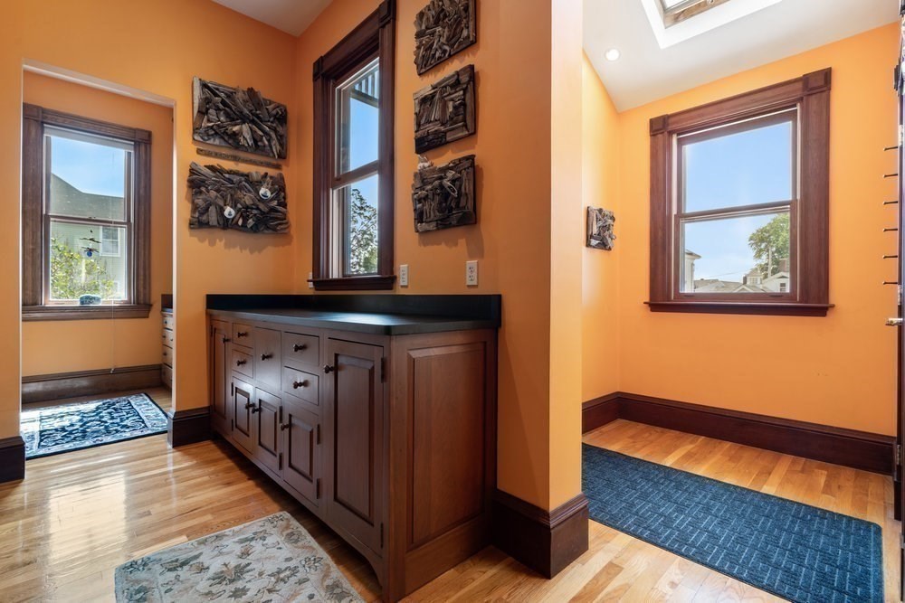 191 Cottage Park Road Winthrop, MA 02152 - Photo 18 of 41 a bedroom with a bed and a window