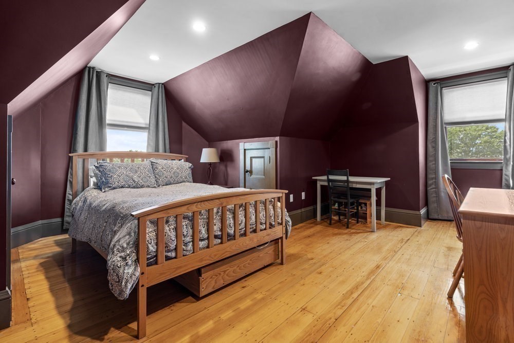 191 Cottage Park Road Winthrop, MA 02152 - Photo 27 of 41 a bed room with a bed and a chair