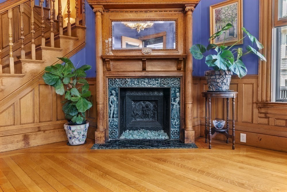 191 Cottage Park Road Winthrop, MA 02152 - Photo 3 of 41 a living room with furniture and a fireplace