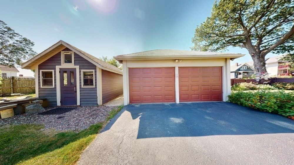 191 Cottage Park Road Winthrop, MA 02152 - Photo 36 of 41 a front view of a house with a yard and garage