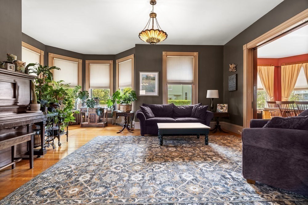 191 Cottage Park Road Winthrop, MA 02152 - Photo 6 of 41 a living room with furniture and a large window