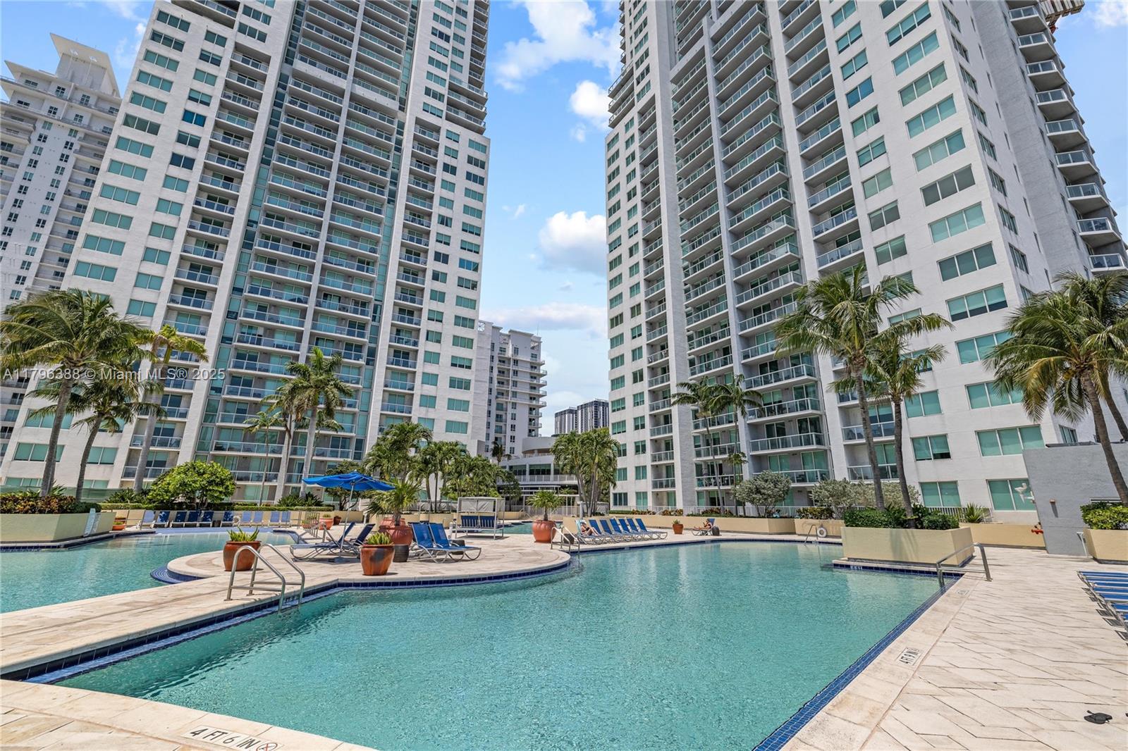 244 Biscayne Boulevard, Unit 645 Miami, FL 33132 - Photo 15 of 45 a view of swimming pool with outdoor seating and lake view