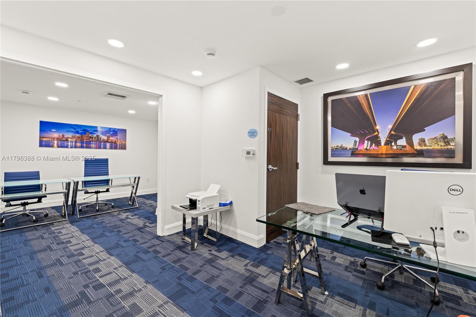 244 Biscayne Boulevard, Unit 645 Miami, FL 33132 - Photo 20 of 45 a living room with furniture and a flat screen tv