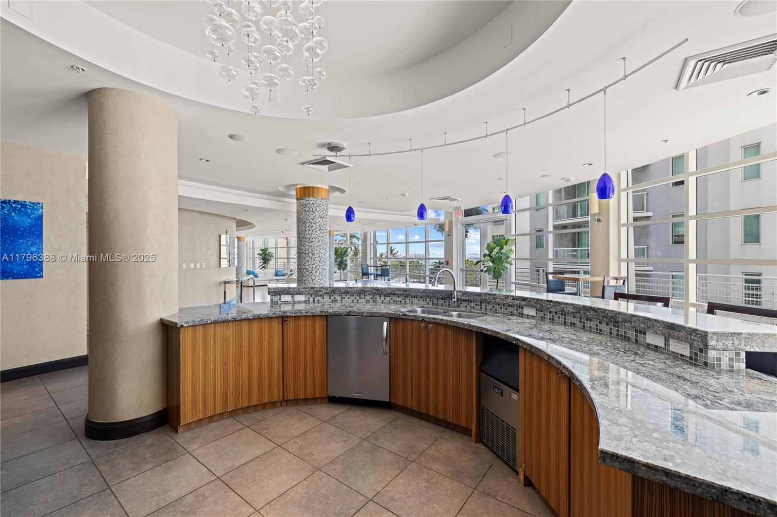 244 Biscayne Boulevard, Unit 645 Miami, FL 33132 - Photo 25 of 45 a kitchen with lots of counter space and a sink