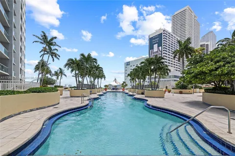 a view of a swimming pool from a patio