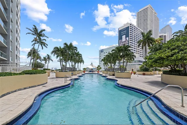 a view of a swimming pool from a patio