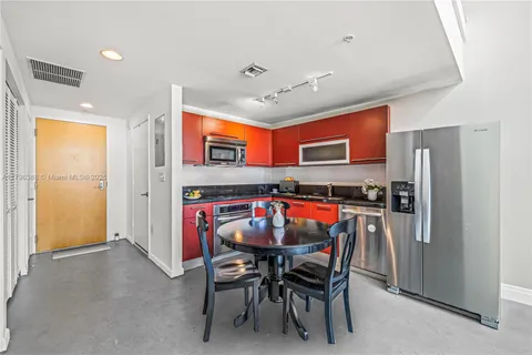 a view of a dining room with furniture