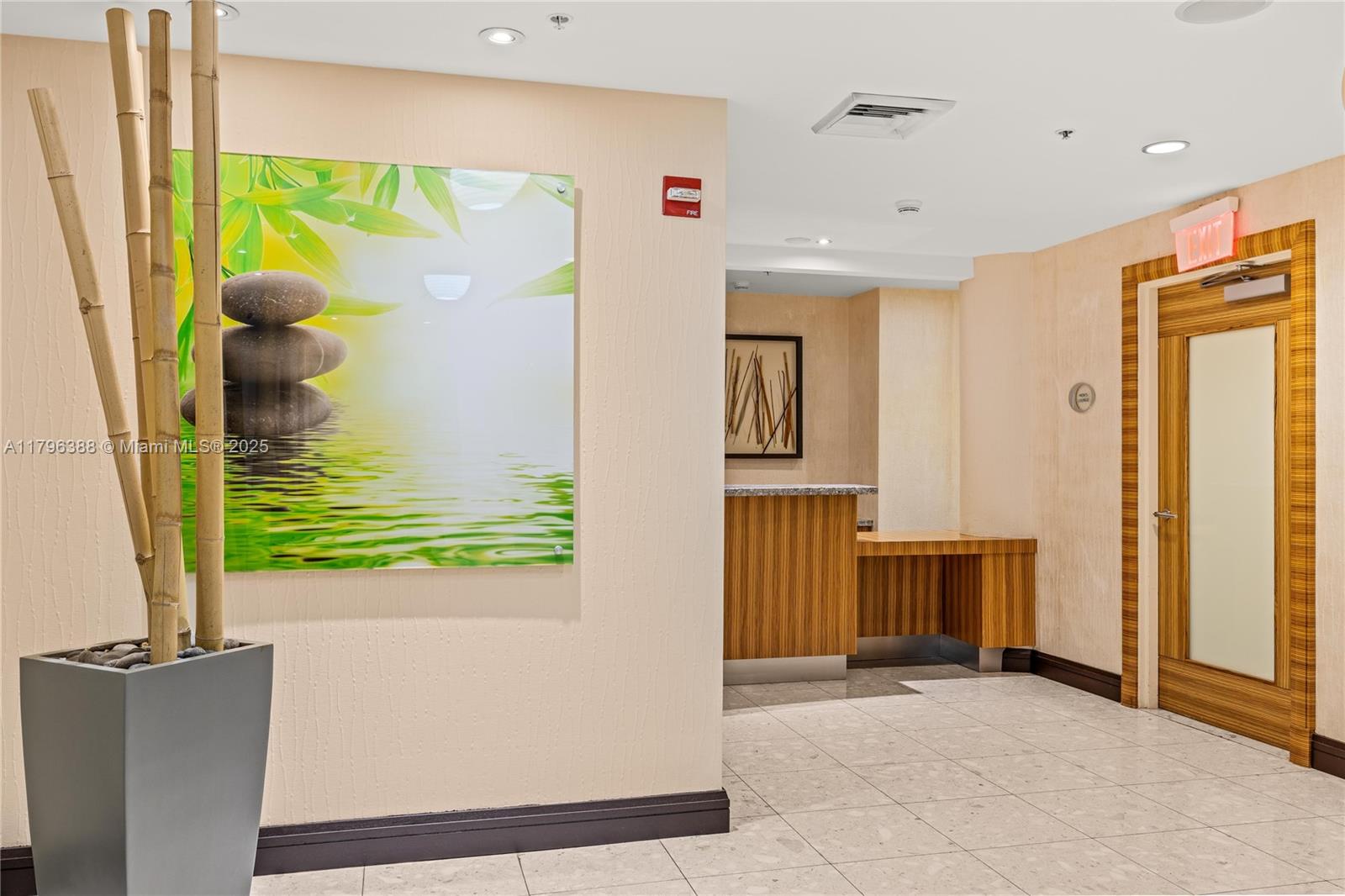 244 Biscayne Boulevard, Unit 645 Miami, FL 33132 - Photo 33 of 45 a view of a hallway with painted walls