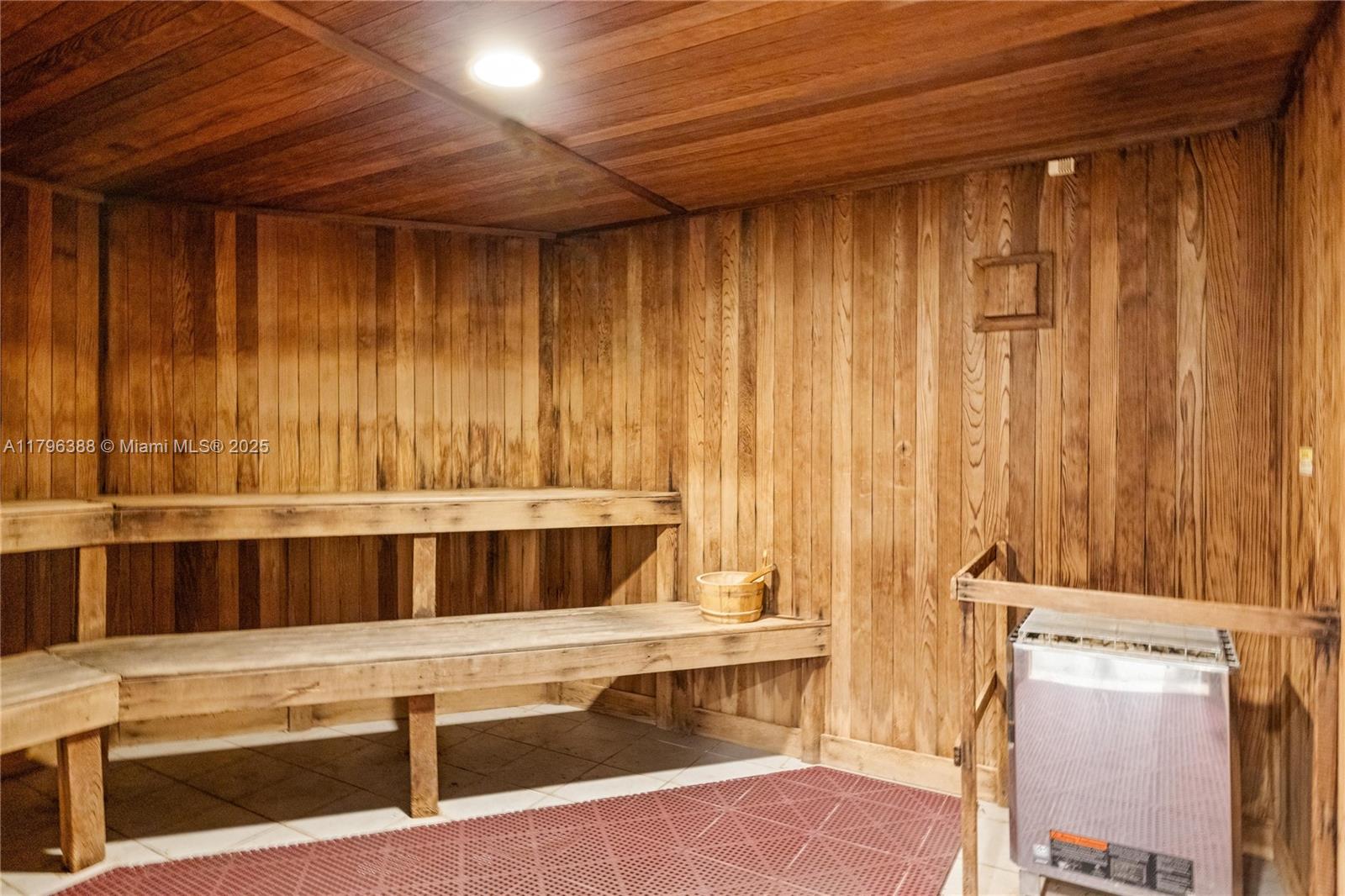 244 Biscayne Boulevard, Unit 645 Miami, FL 33132 - Photo 35 of 45 a bathroom with a sink and a mirror