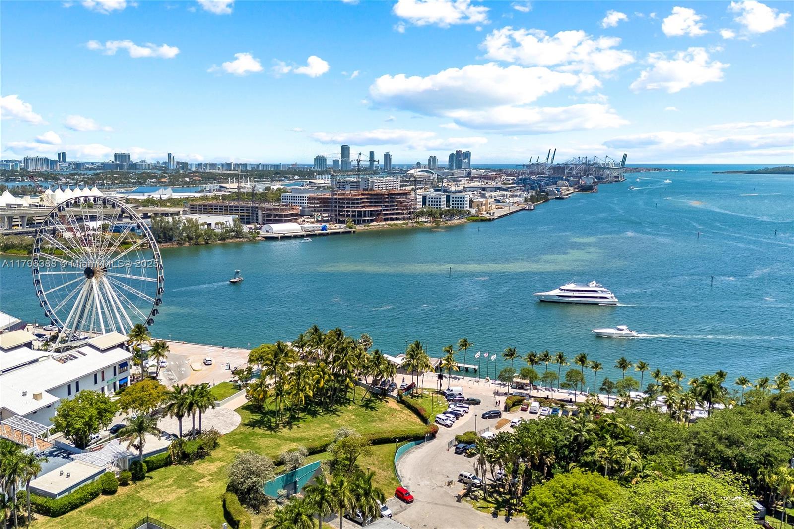 244 Biscayne Boulevard, Unit 645 Miami, FL 33132 - Photo 38 of 45 a view of a lake with a city