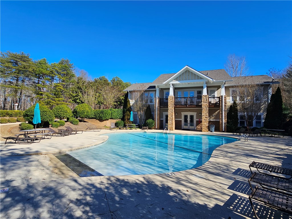 302 Lookover Drive Anderson, SC 29621 - Photo 15 of 23 Relax poolside at this inviting community hub, perfect for leisure and social gatherings.