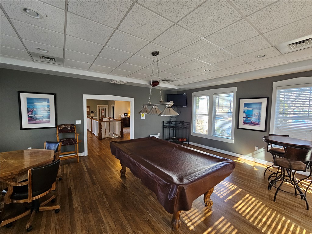 302 Lookover Drive Anderson, SC 29621 - Photo 18 of 23 This recreational area features gleaming wood floors and ample natural light, creating an inviting atmosphere.