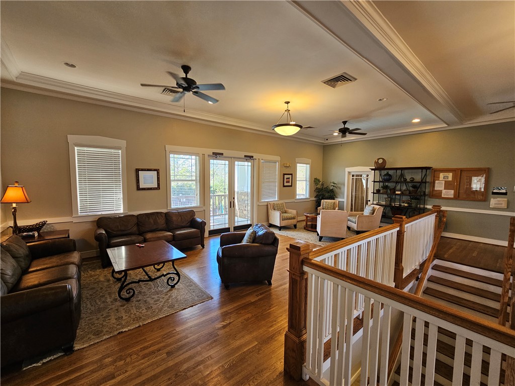 302 Lookover Drive Anderson, SC 29621 - Photo 19 of 23 This inviting common area features hardwood floors and crown molding.