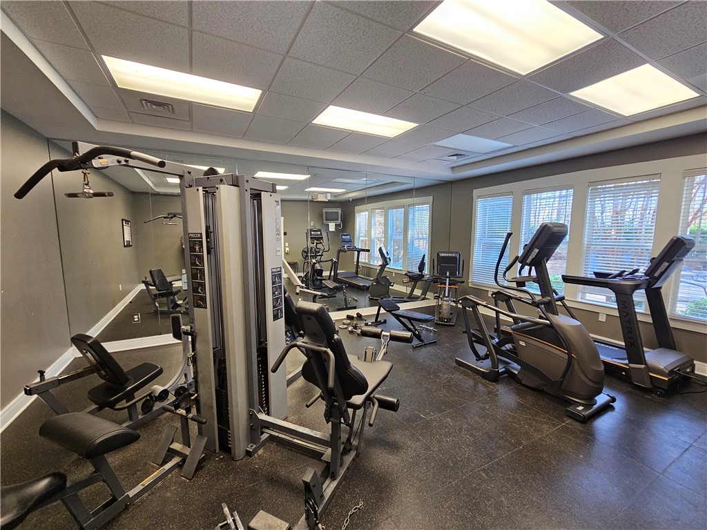 302 Lookover Drive Anderson, SC 29621 - Photo 20 of 23 This gym offers a well-equipped fitness space with ample natural light.