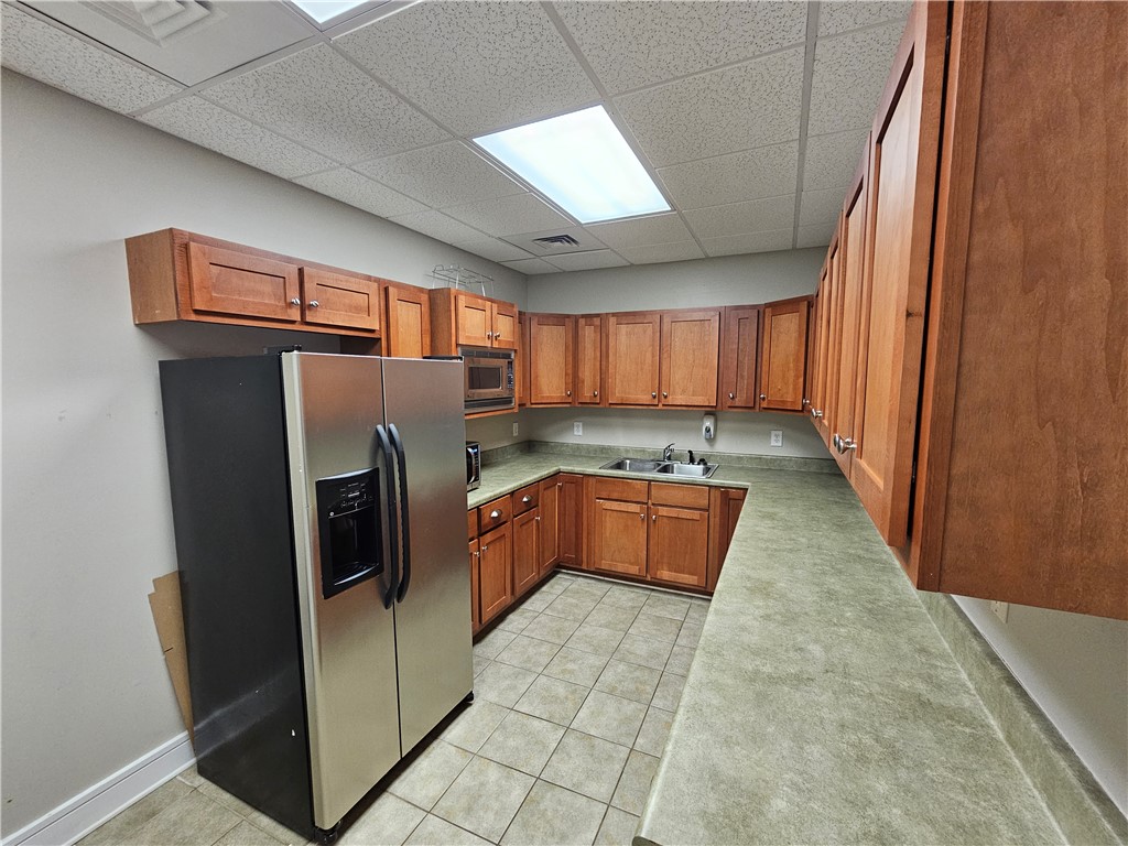 302 Lookover Drive Anderson, SC 29621 - Photo 22 of 23 This spacious kitchen offers ample cabinetry, modern appliances, and durable flooring for daily living.