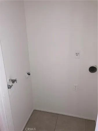 a bathroom with a shower and a toilet