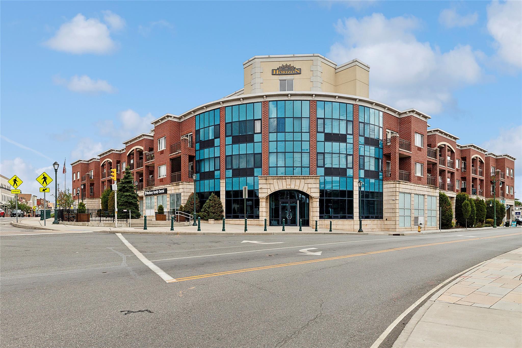 130 Post Avenue, Unit 316 Westbury, NY 11590 - Photo 2 of 15 View of building exterior