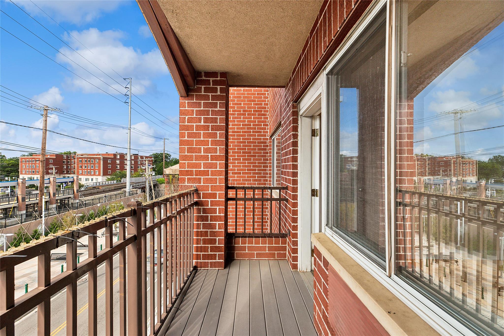 130 Post Avenue, Unit 316 Westbury, NY 11590 - Photo 9 of 15 Balcony with a view of city