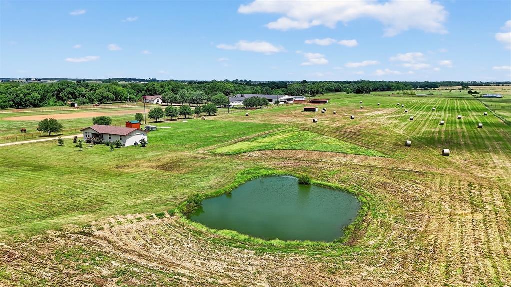 1717 Batey Road Collinsville, TX 76233 - Photo 4 of 40 a view of a lake with outdoor space