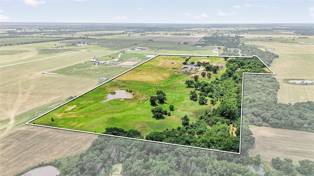 1717 Batey Road Collinsville, TX 76233 - Photo 6 of 40 a view of an outdoor space and swimming pool