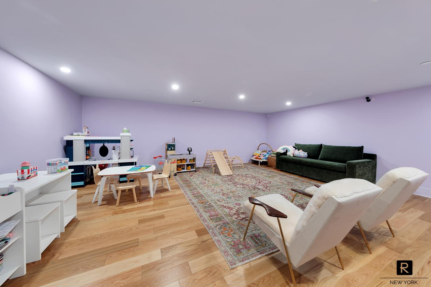 30 Sullivan Street Manhattan, NY 10012 - Photo 20 of 25 a living room with furniture and a flat screen tv