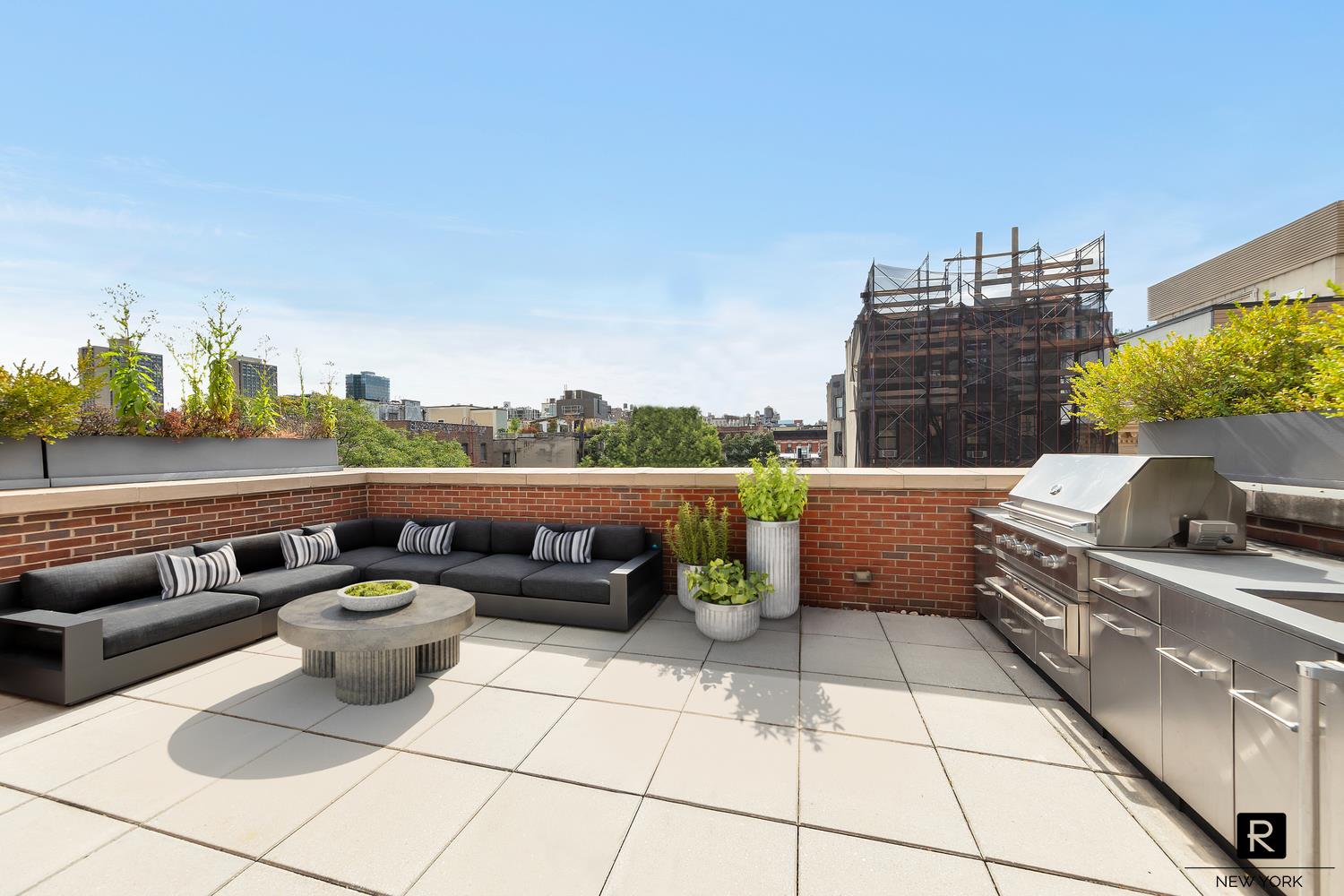 30 Sullivan Street Manhattan, NY 10012 - Photo 21 of 25 a terrace with outdoor seating and barbeque oven