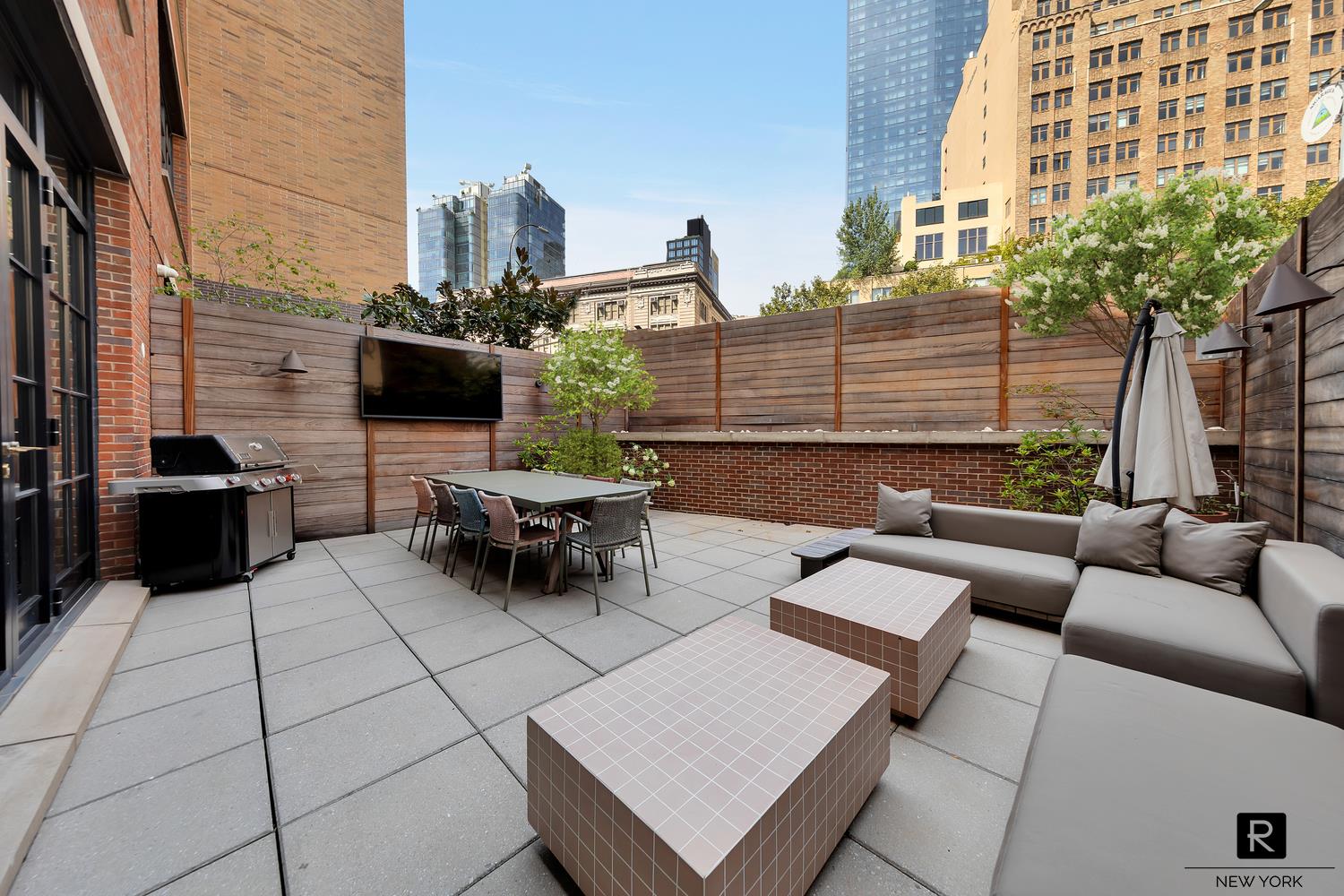 30 Sullivan Street Manhattan, NY 10012 - Photo 8 of 25 a view of terrace with seating space and building view