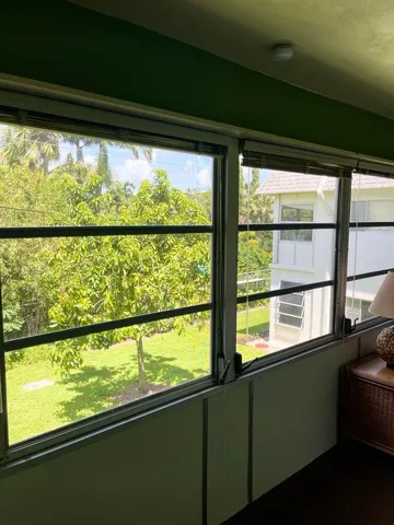 a view of a bathroom with a glass door